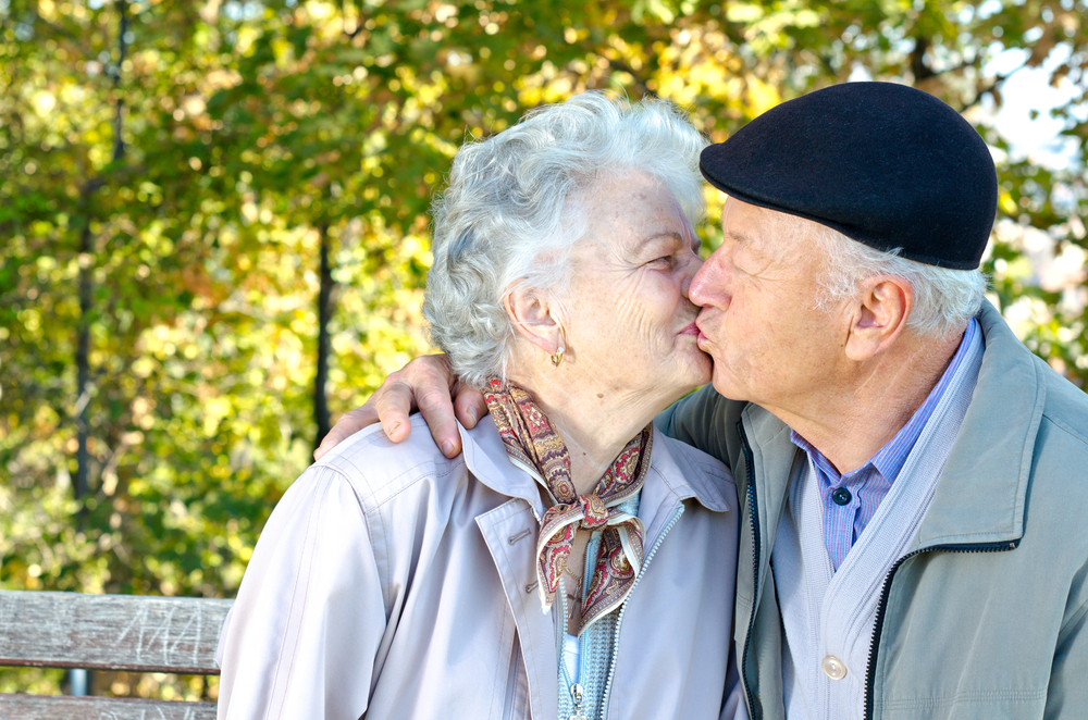 senior couple kissing.jpg